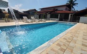 Casa piscina pé na areia Bertioga
